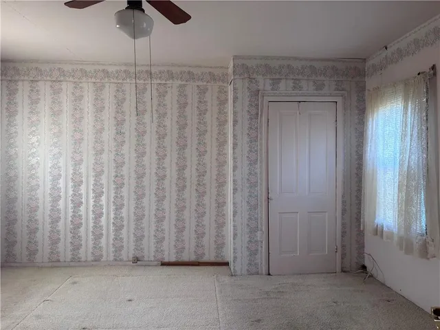 an empty room with windows