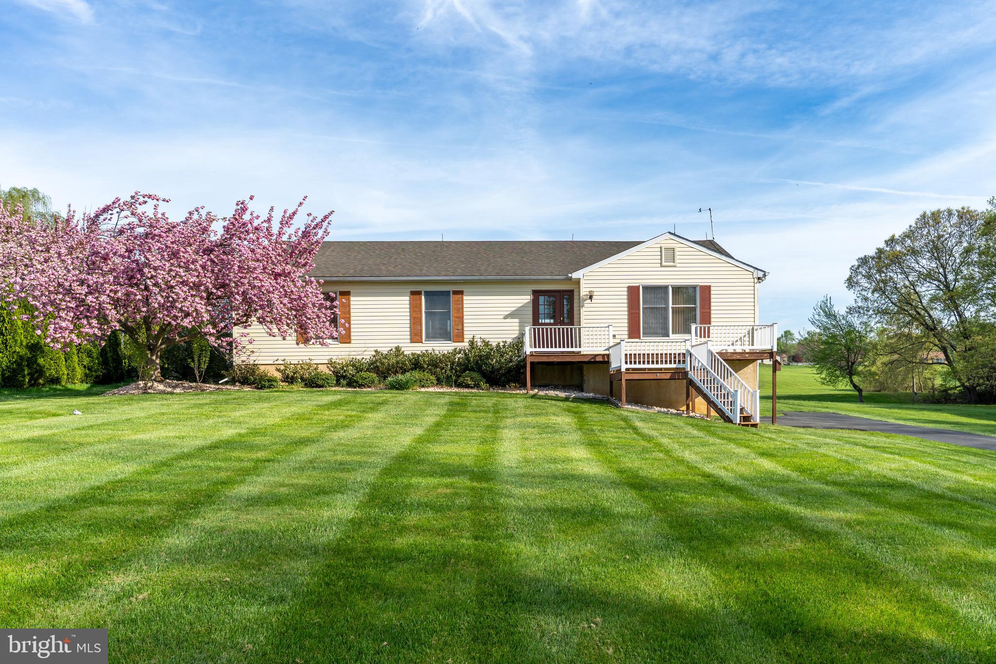 9 Drake Road Chesapeake City, MD 21915 - Photo 33 of 39 a view of a house with a big yard and potted plants