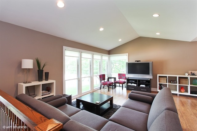 1230 Kenton Road Deerfield, IL 60015 - Photo 3 of 22 a living room with furniture and a flat screen tv