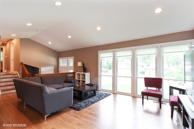 1230 Kenton Road Deerfield, IL 60015 - Photo 4 of 22 a living room with furniture and a large window