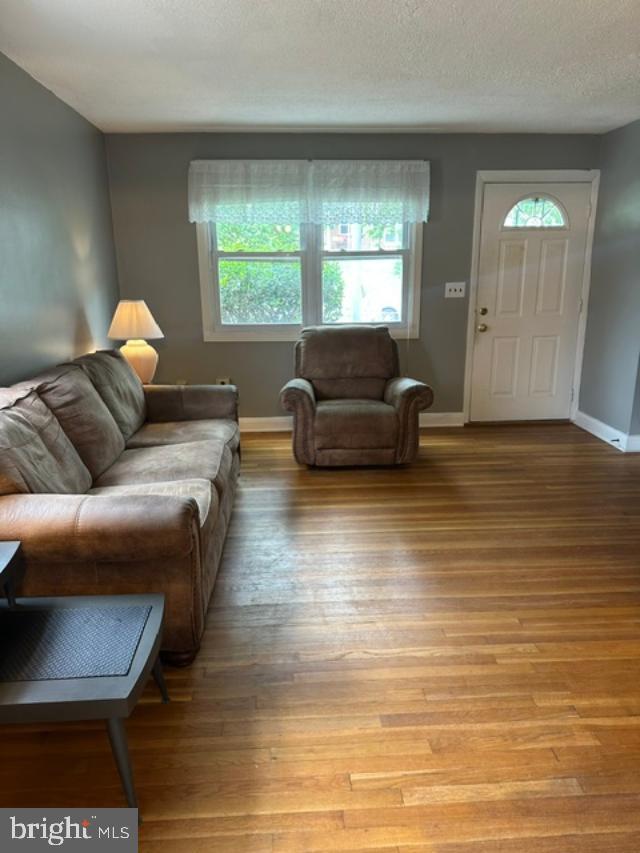 1619 Inverness Avenue Baltimore, MD 21230 - Photo 5 of 30 a living room with furniture and a large window