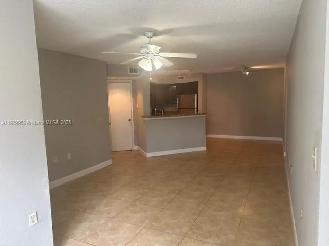 an empty room with a bathroom