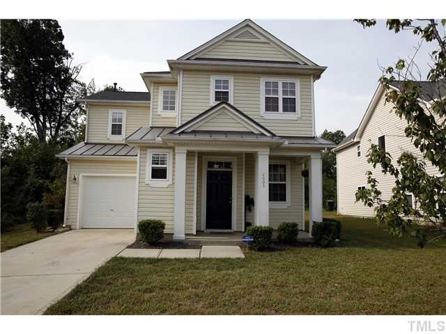 2605 Quarry Ridge Lane Raleigh, NC 27610 - Photo 1 of 8 a front view of a house with a yard