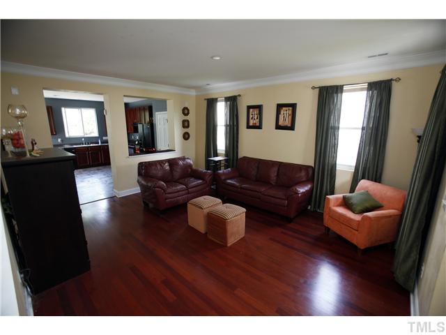 2605 Quarry Ridge Lane Raleigh, NC 27610 - Photo 2 of 8 a living room with furniture wooden floor and a window