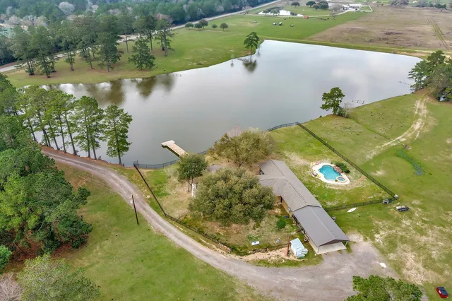 a view of a lake with a yard