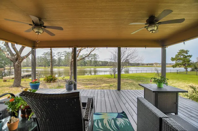 a kitchen with a stove a sink and a microwave