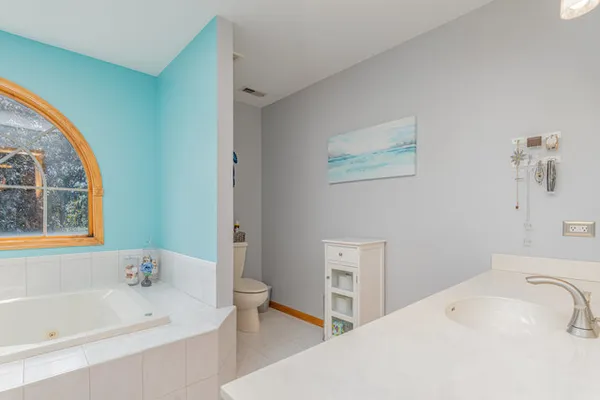 a bathroom with a sink and a bathtub