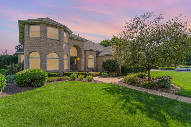 13741 Elizabeth Lane Mokena, IL 60448 - Photo 2 of 29 a front view of a house with a yard and trees