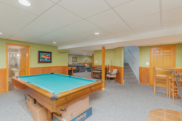 13741 Elizabeth Lane Mokena, IL 60448 - Photo 24 of 29 a living room with furniture pool table and blue walls