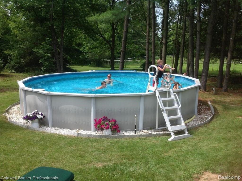 4777 Six Mile Road South Lyon, MI 48178 - Photo 55 of 71 A pool to cool off in during the summer