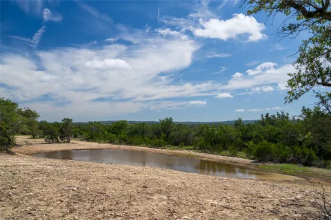 a view of pool and lake