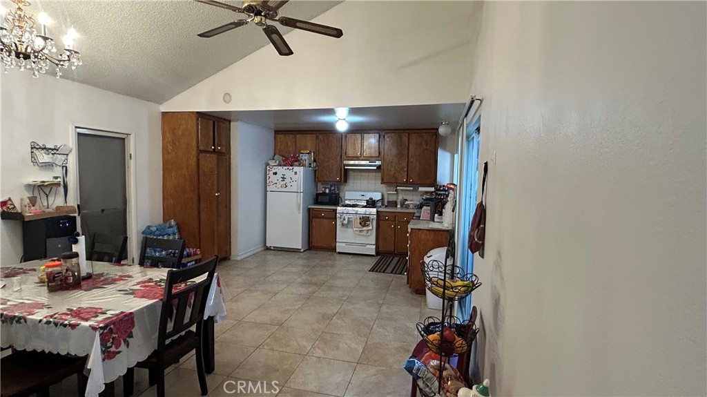 13254 Powers Court Poway, CA 92064 - Photo 3 of 11 a view of a kitchen and dining room