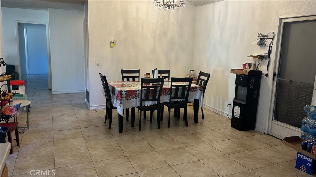 13254 Powers Court Poway, CA 92064 - Photo 5 of 11 a view of a dining room with furniture