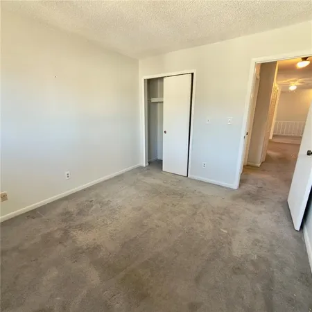 an empty room with a bathroom