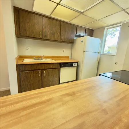a view of a kitchen with a sink