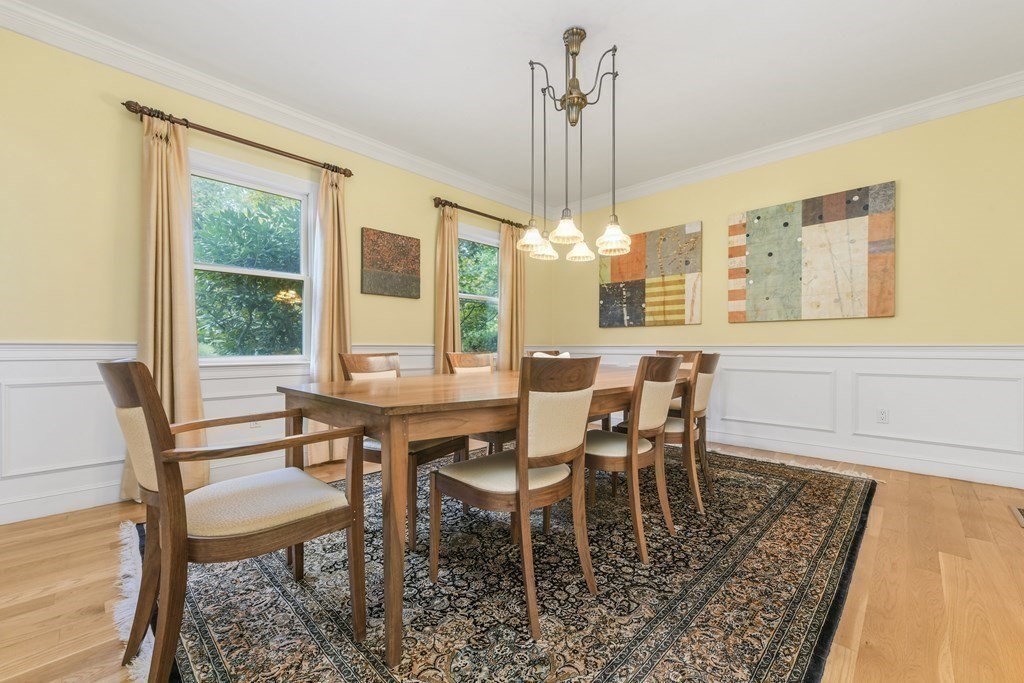 39 Brooks Road Lincoln, MA 01773 - Photo 12 of 40 a view of a dining room with furniture wooden floor and chandelier