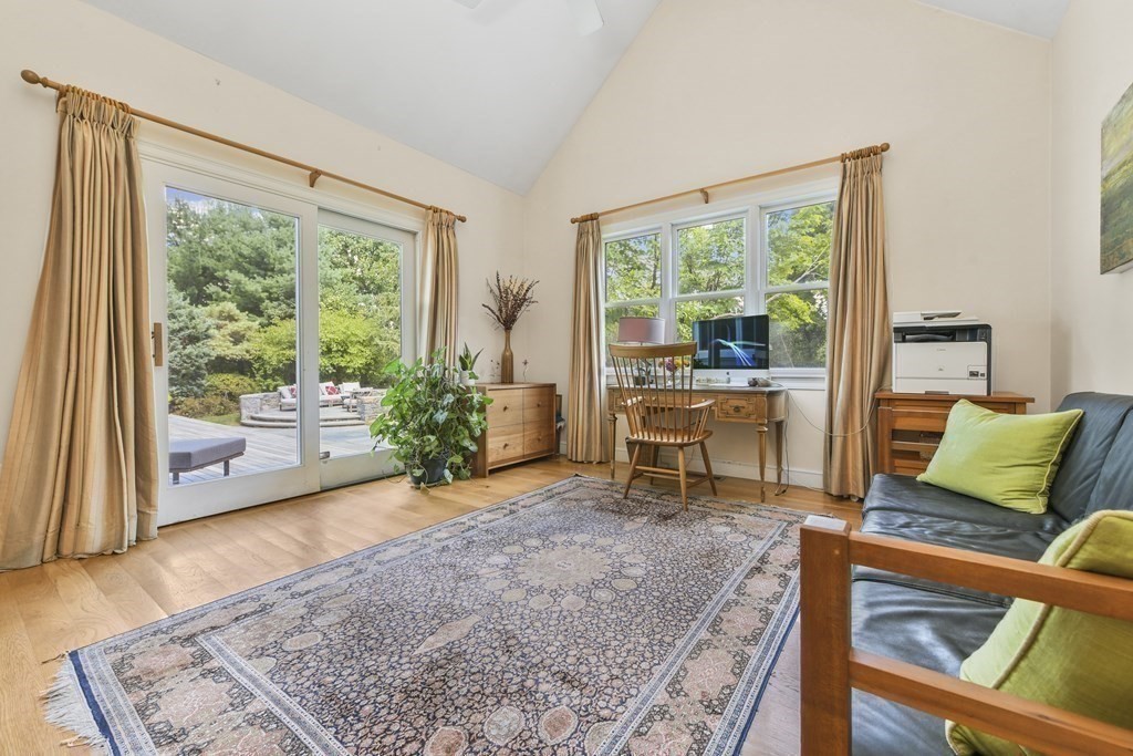 39 Brooks Road Lincoln, MA 01773 - Photo 14 of 40 a living room with furniture and a large window