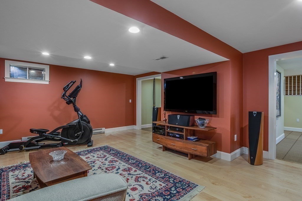 39 Brooks Road Lincoln, MA 01773 - Photo 22 of 40 a room with furniture and a flat screen tv