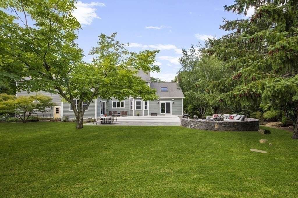 39 Brooks Road Lincoln, MA 01773 - Photo 30 of 40 a view of a house with a big yard and a large tree