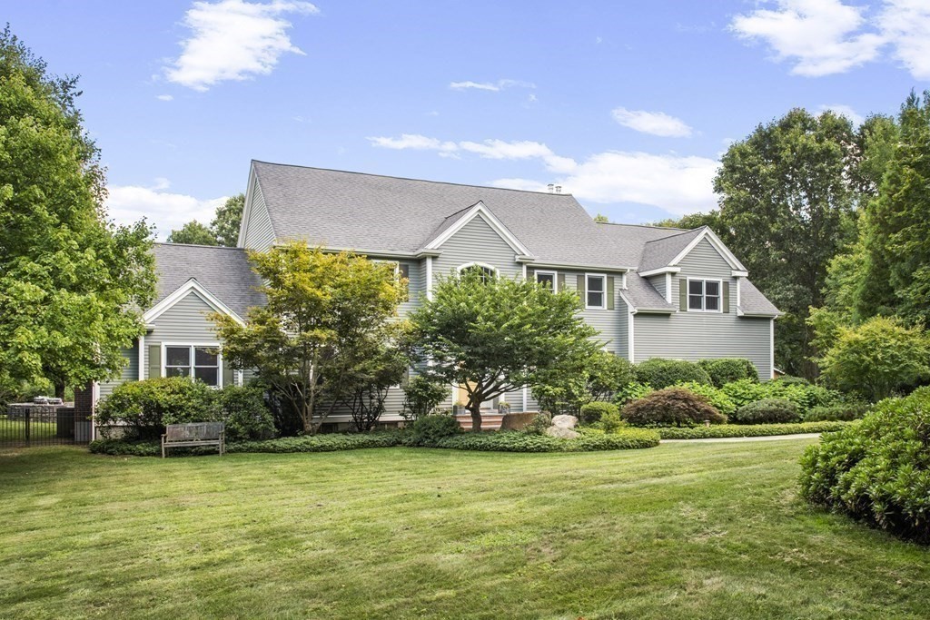 39 Brooks Road Lincoln, MA 01773 - Photo 3 of 40 a front view of a house with a garden