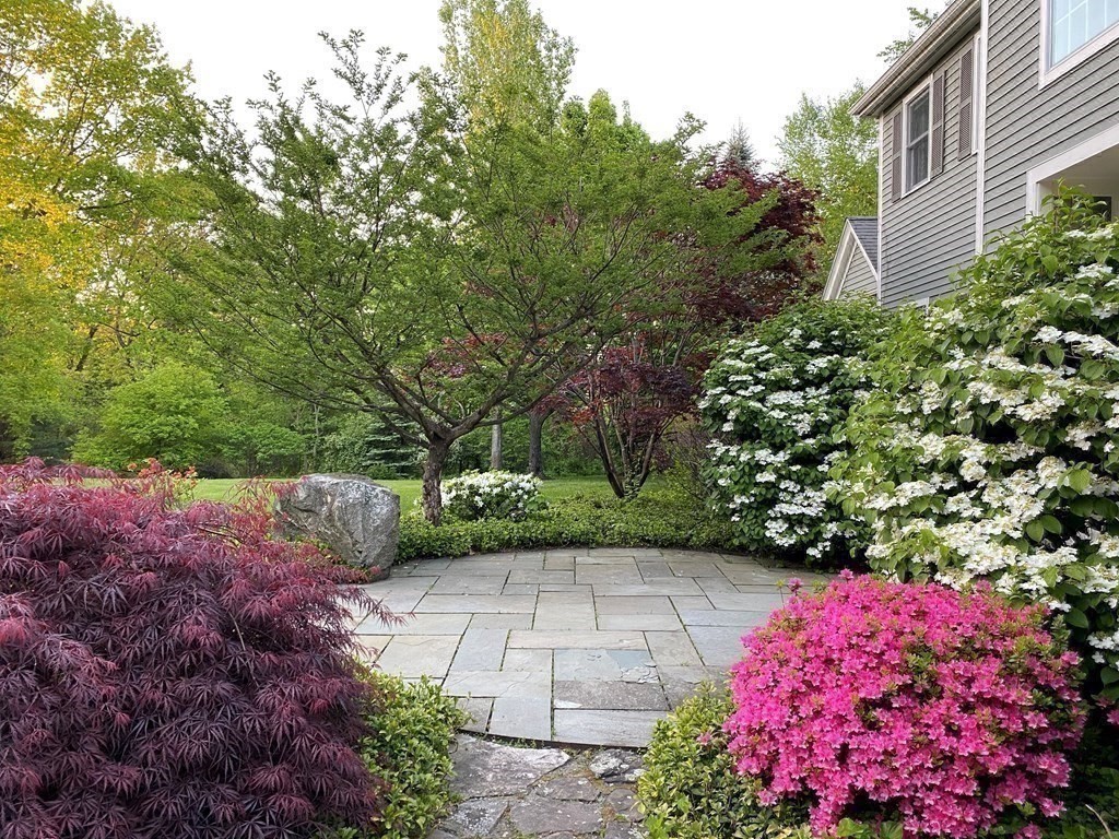 39 Brooks Road Lincoln, MA 01773 - Photo 33 of 40 a view of a yard with plants and large trees