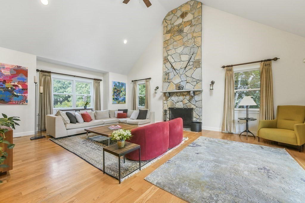 39 Brooks Road Lincoln, MA 01773 - Photo 5 of 40 a living room with fireplace furniture and a large window