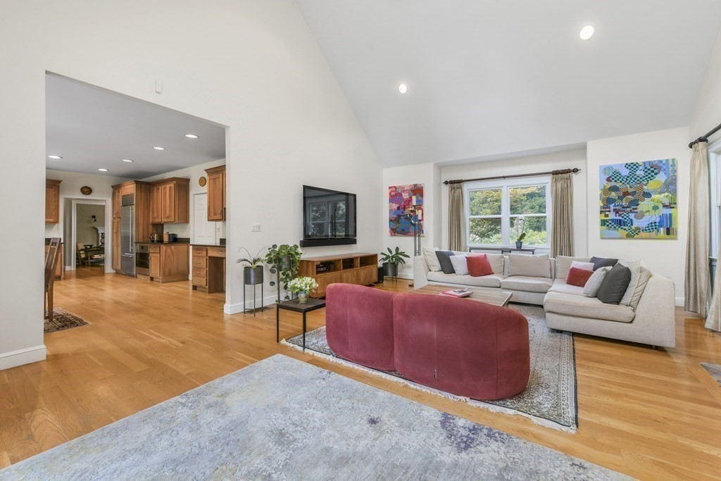 39 Brooks Road Lincoln, MA 01773 - Photo 8 of 40 a living room with furniture and a flat screen tv
