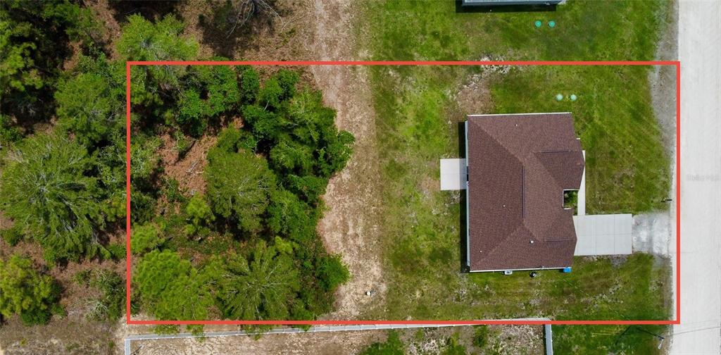 13486 English Sparrow Road Weeki Wachee, FL 34614 - Photo 47 of 51 front view of house with a yard