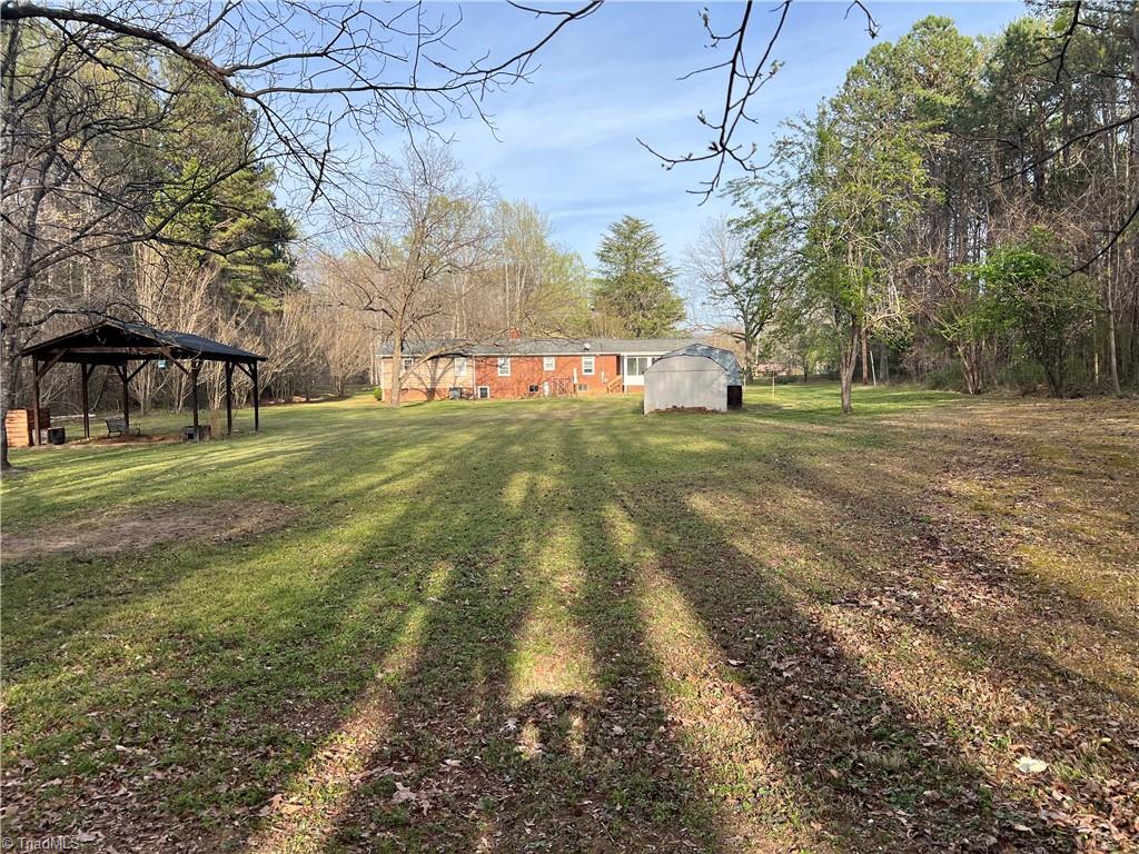 2183 Rowe Road Lexington, NC 27295 - Photo 42 of 42 Welcome to your outdoor oasis with a great mix of open ground and woods. Many, many options and projects to explore.