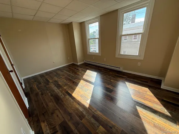 a view of an empty room and window
