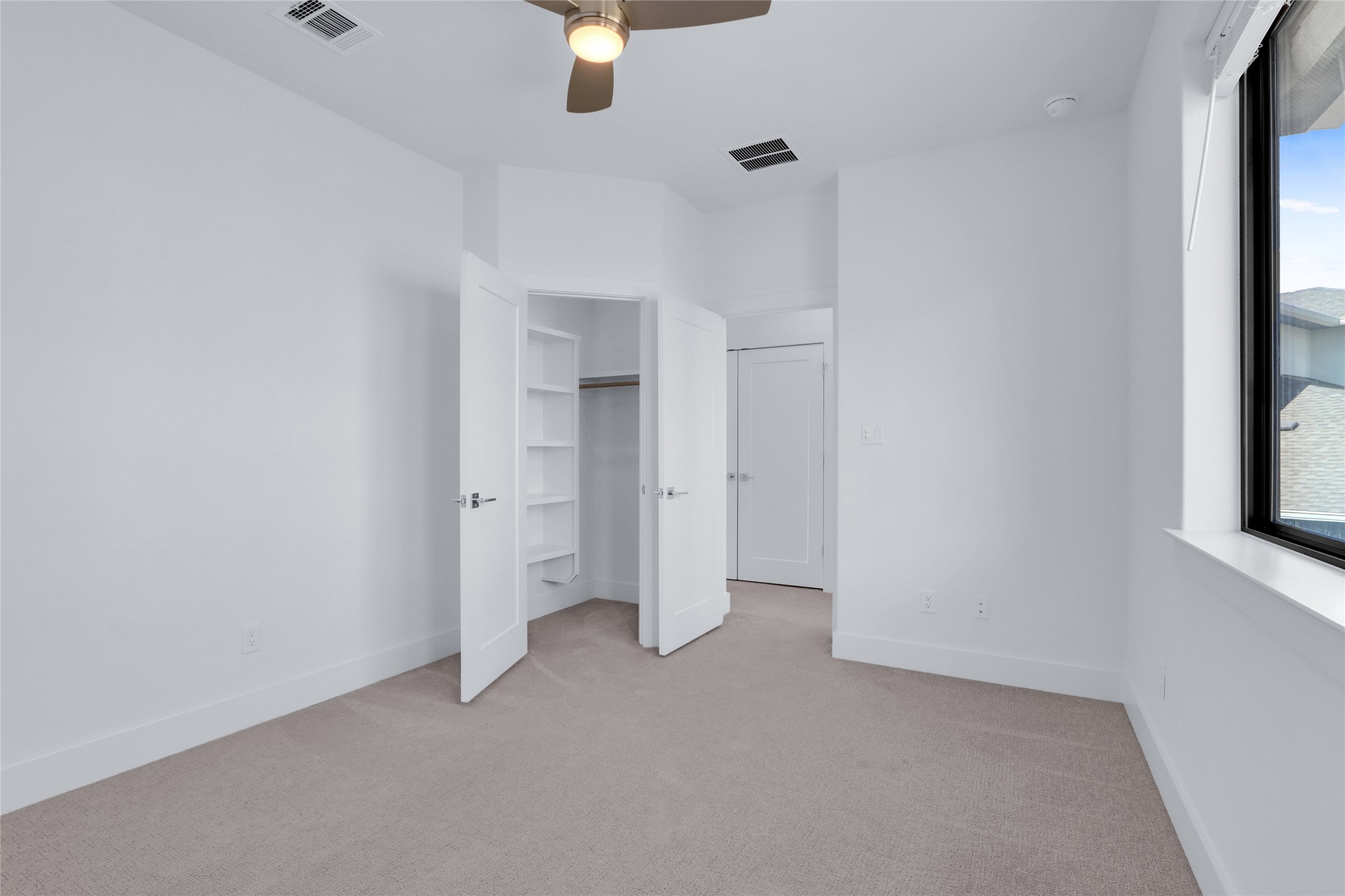 2050 Lohmans Spur Road, Unit 501 Lakeway, TX 78738 - Photo 22 of 40 an empty room with windows