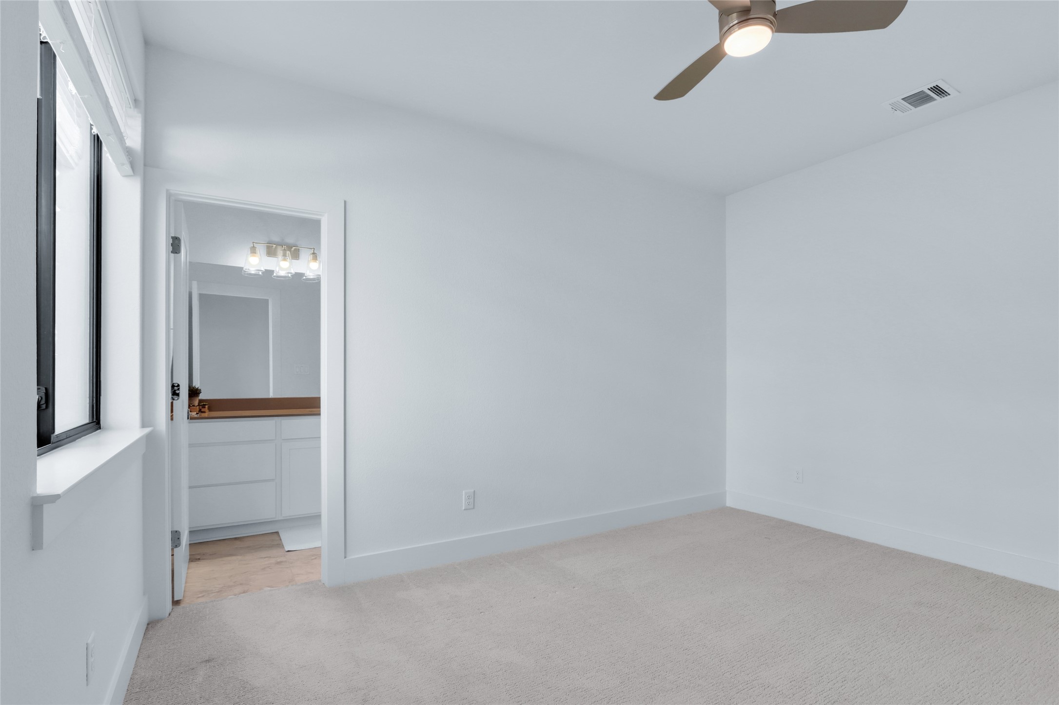 2050 Lohmans Spur Road, Unit 501 Lakeway, TX 78738 - Photo 25 of 40 an empty room with a bathroom