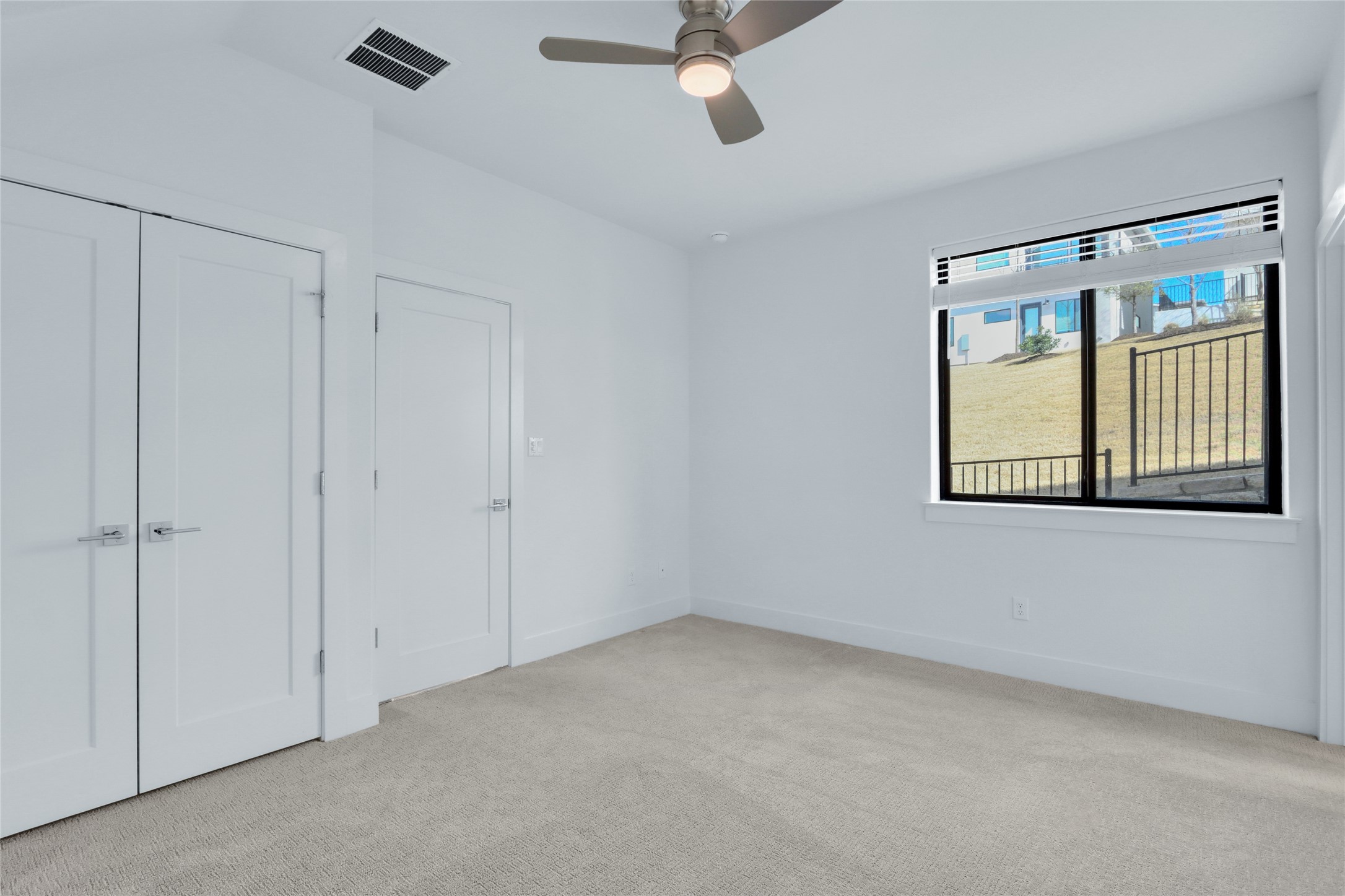 2050 Lohmans Spur Road, Unit 501 Lakeway, TX 78738 - Photo 26 of 40 a view of an empty room with a window