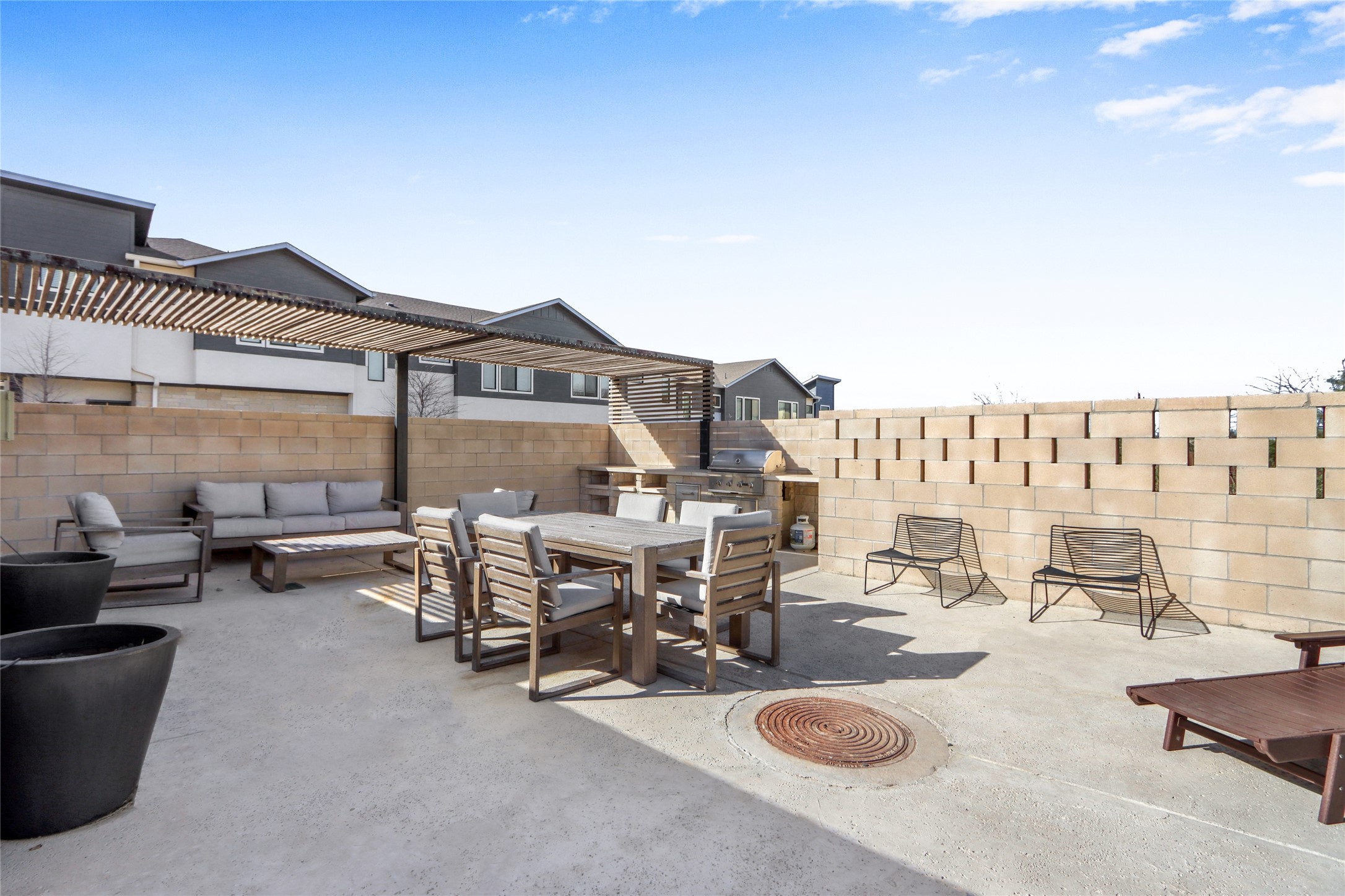 2050 Lohmans Spur Road, Unit 501 Lakeway, TX 78738 - Photo 31 of 40 a view of a patio with table and chairs
