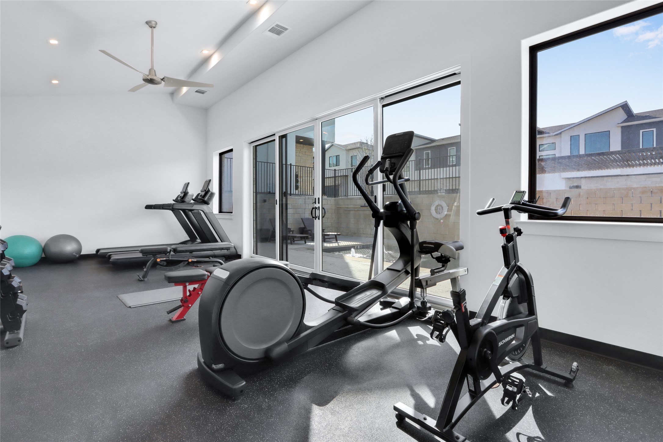 2050 Lohmans Spur Road, Unit 501 Lakeway, TX 78738 - Photo 32 of 40 a view of a room with gym equipment
