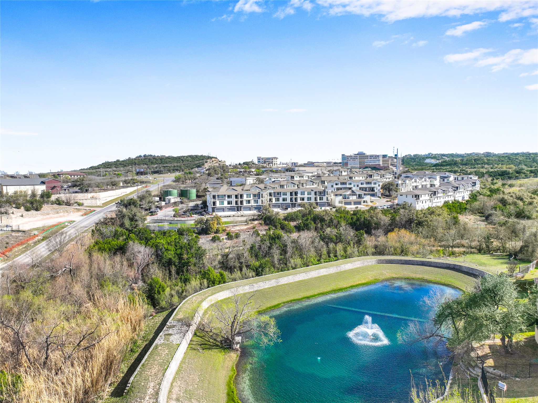 2050 Lohmans Spur Road, Unit 501 Lakeway, TX 78738 - Photo 39 of 40 a view of city and swimming pool