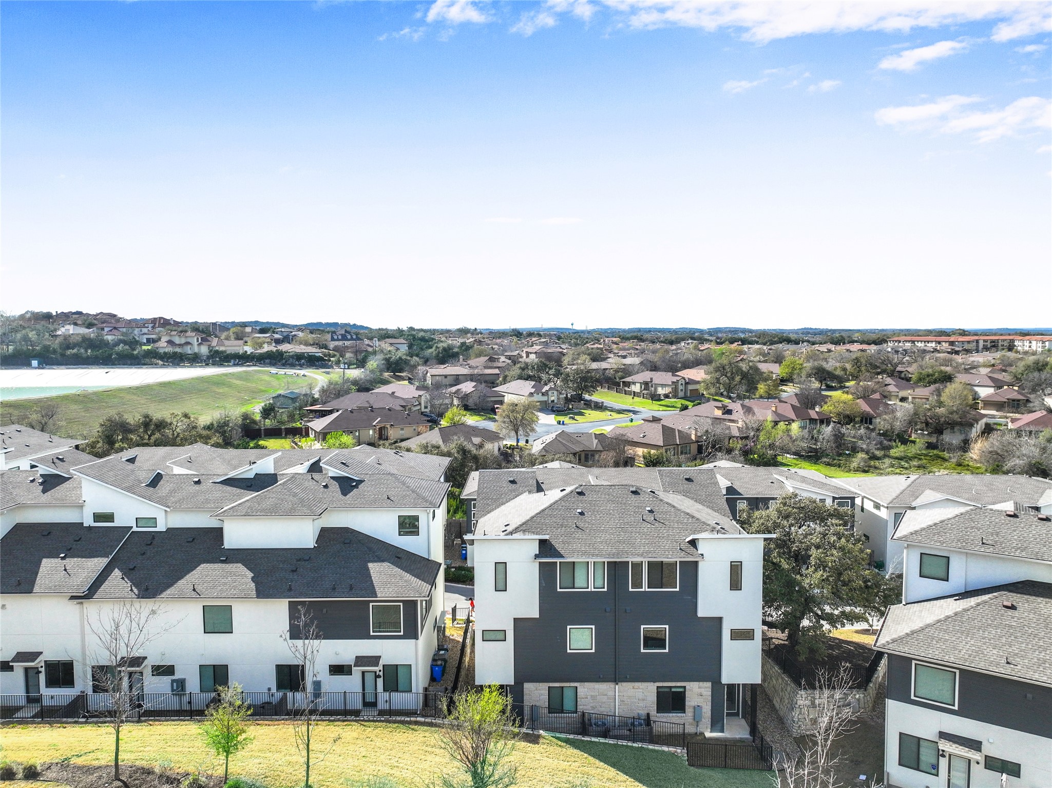 2050 Lohmans Spur Road, Unit 501 Lakeway, TX 78738 - Photo 40 of 40 a view of a city with tall buildings