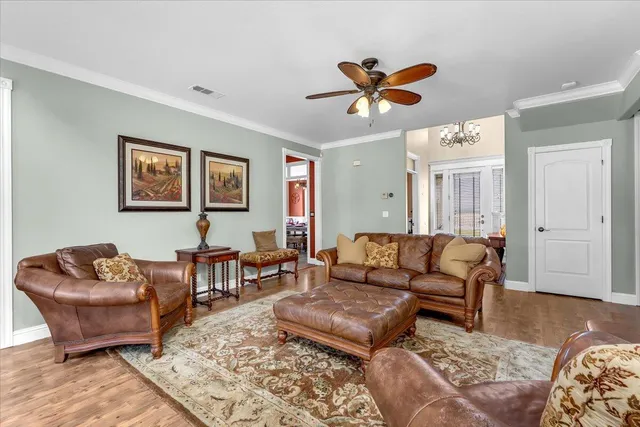 a kitchen with stainless steel appliances granite countertop a sink and cabinets