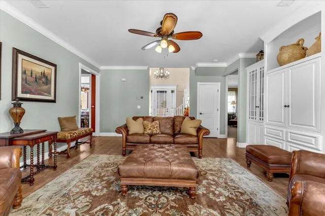 a view of a dining room with furniture window and chandelier