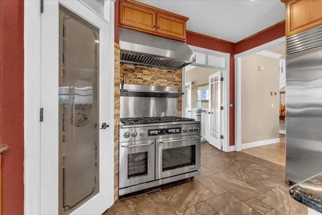 a bedroom with furniture and a flat screen tv