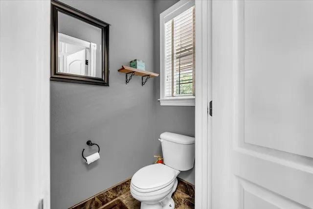 a view of a swimming pool with a yard