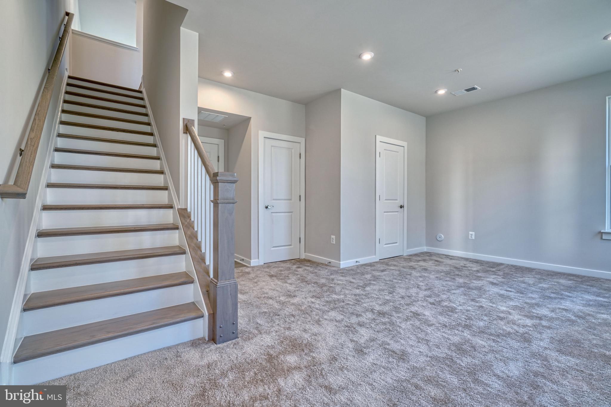 5612 Alpha Ridge Avenue Hyattsville, MD 20782 - Photo 18 of 70 a view of an empty room with stairs