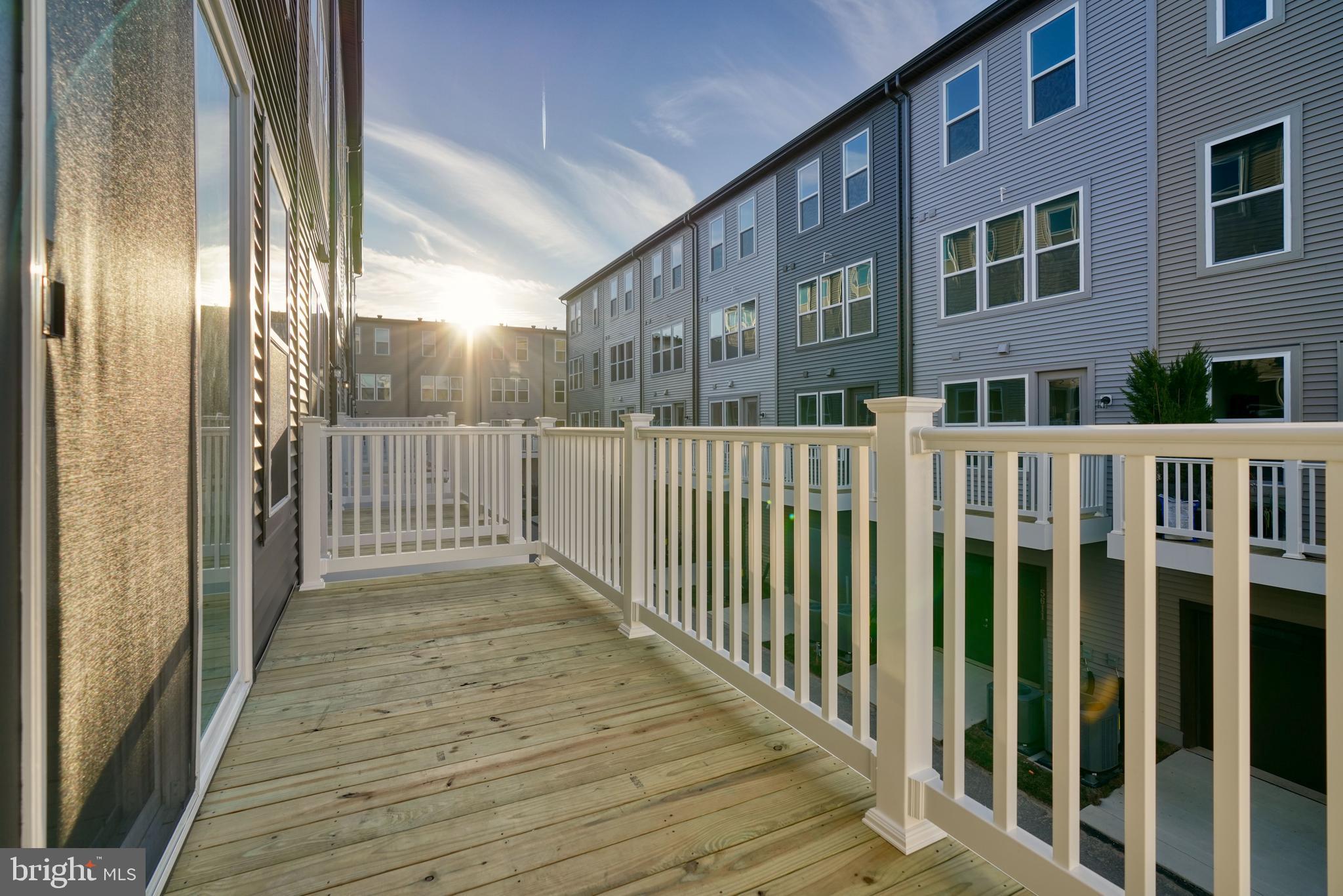 5612 Alpha Ridge Avenue Hyattsville, MD 20782 - Photo 32 of 70 a view of a wooden house with a balcony