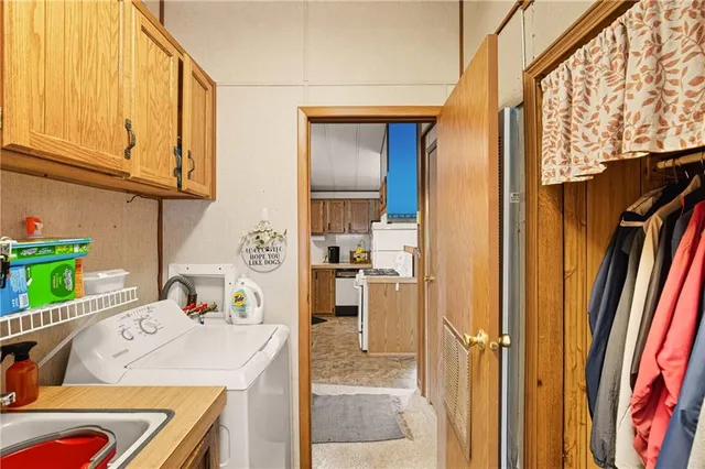 a bathroom with a toilet and a shower curtain