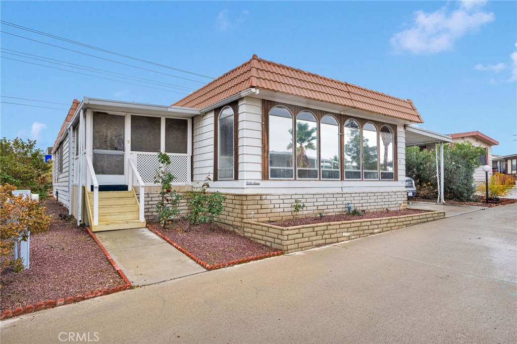 2494 Main Street Barstow, CA 92311 - Photo 1 of 36 front view of a house with a porch