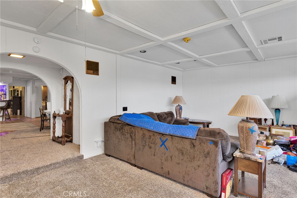 2494 Main Street Barstow, CA 92311 - Photo 11 of 36 a living room with furniture and a table