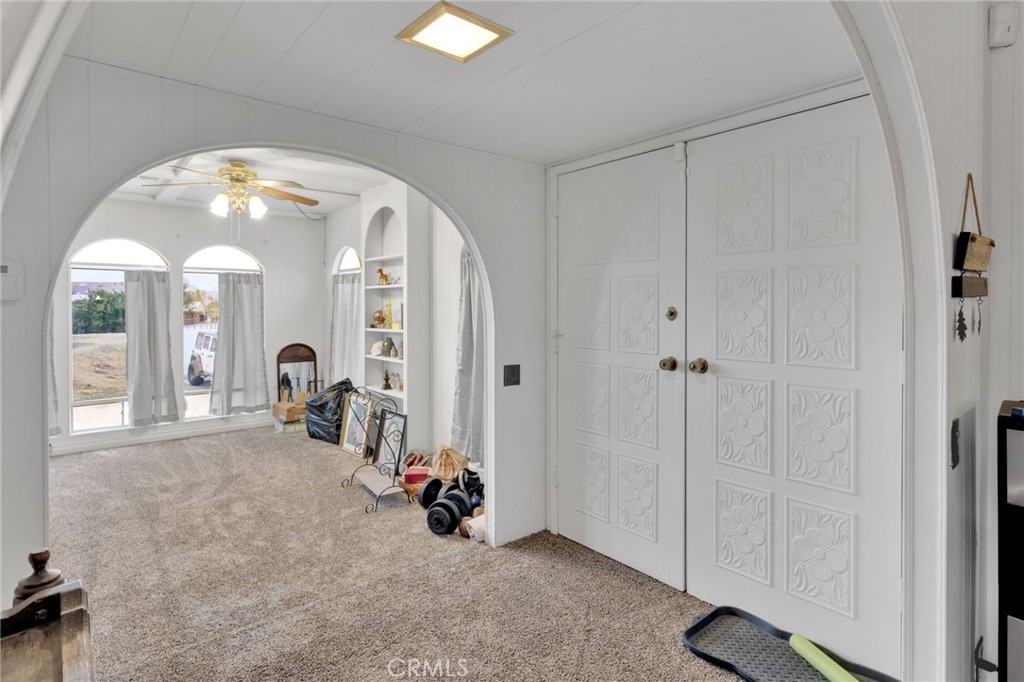 2494 Main Street Barstow, CA 92311 - Photo 7 of 36 a view of a livingroom with a furniture and a large window