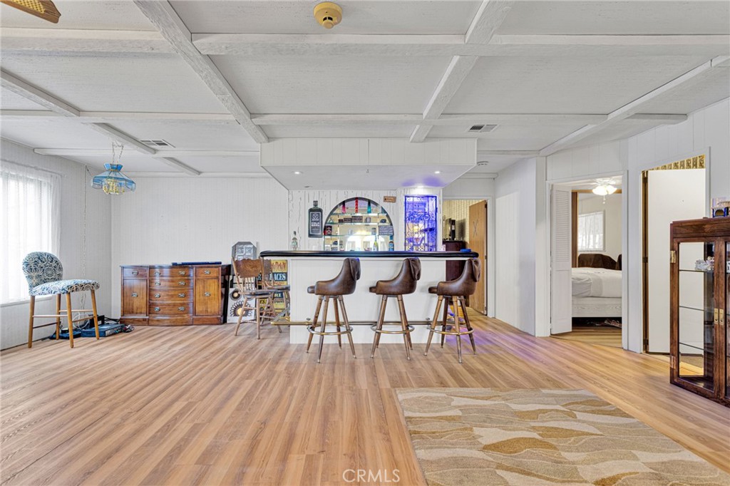 2494 Main Street Barstow, CA 92311 - Photo 8 of 36 a living room with furniture and a wooden floor