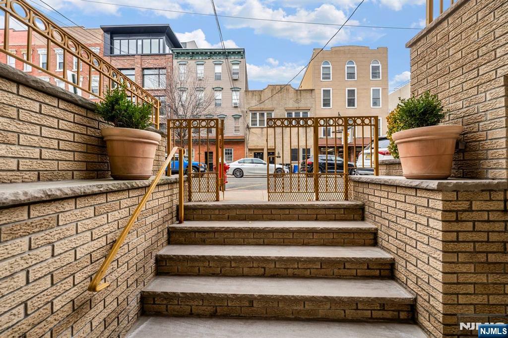 413 Adams Street Hoboken, NJ 07030 - Photo 18 of 40 a view of building with stairs