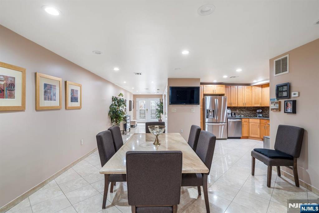 413 Adams Street Hoboken, NJ 07030 - Photo 24 of 40 a view of a dining room with furniture
